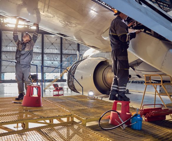engineer-working-on-aircraft-wing-in-aircraft-main-2024-10-19-21-40-03-utc-1536×1024-1 Aircraft engineers working on an airplane wing